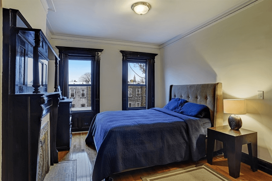 bedroom with mantel