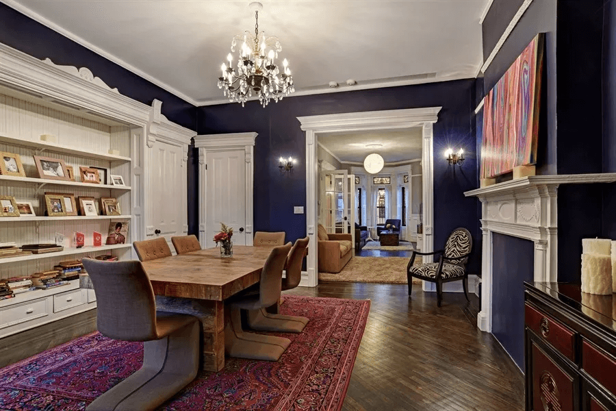 dining room with white painted woodwork and mantel