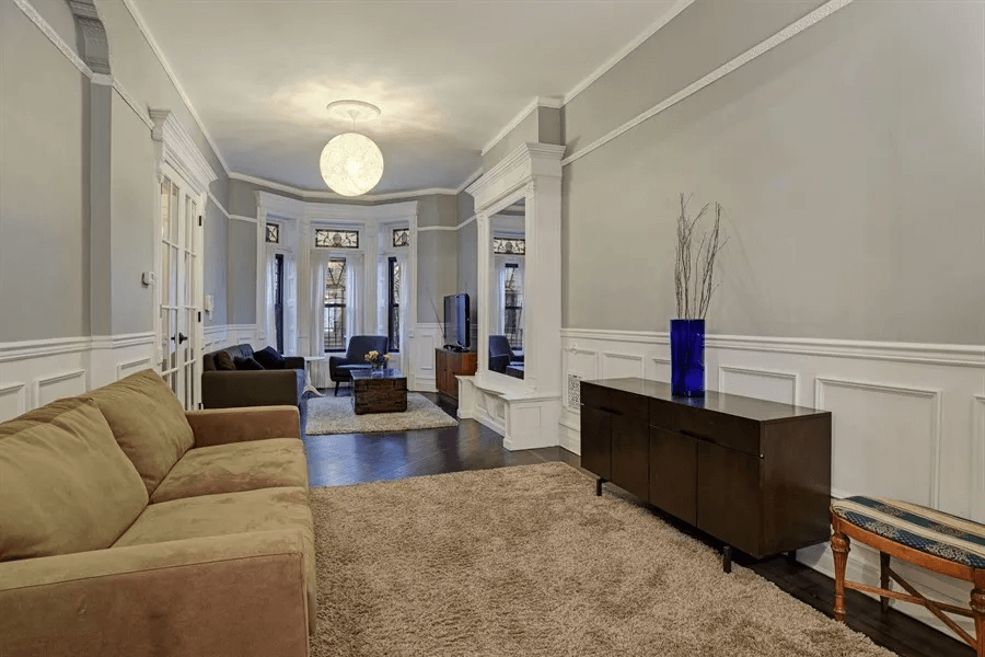 parlor with pier mirror and bay window