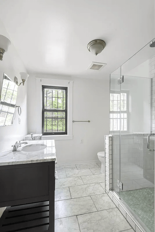 bathroom with glass shower doors