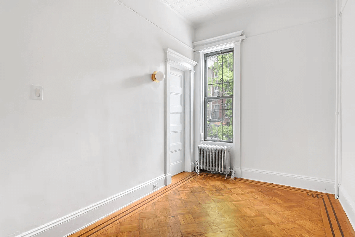 small bedroom with one window