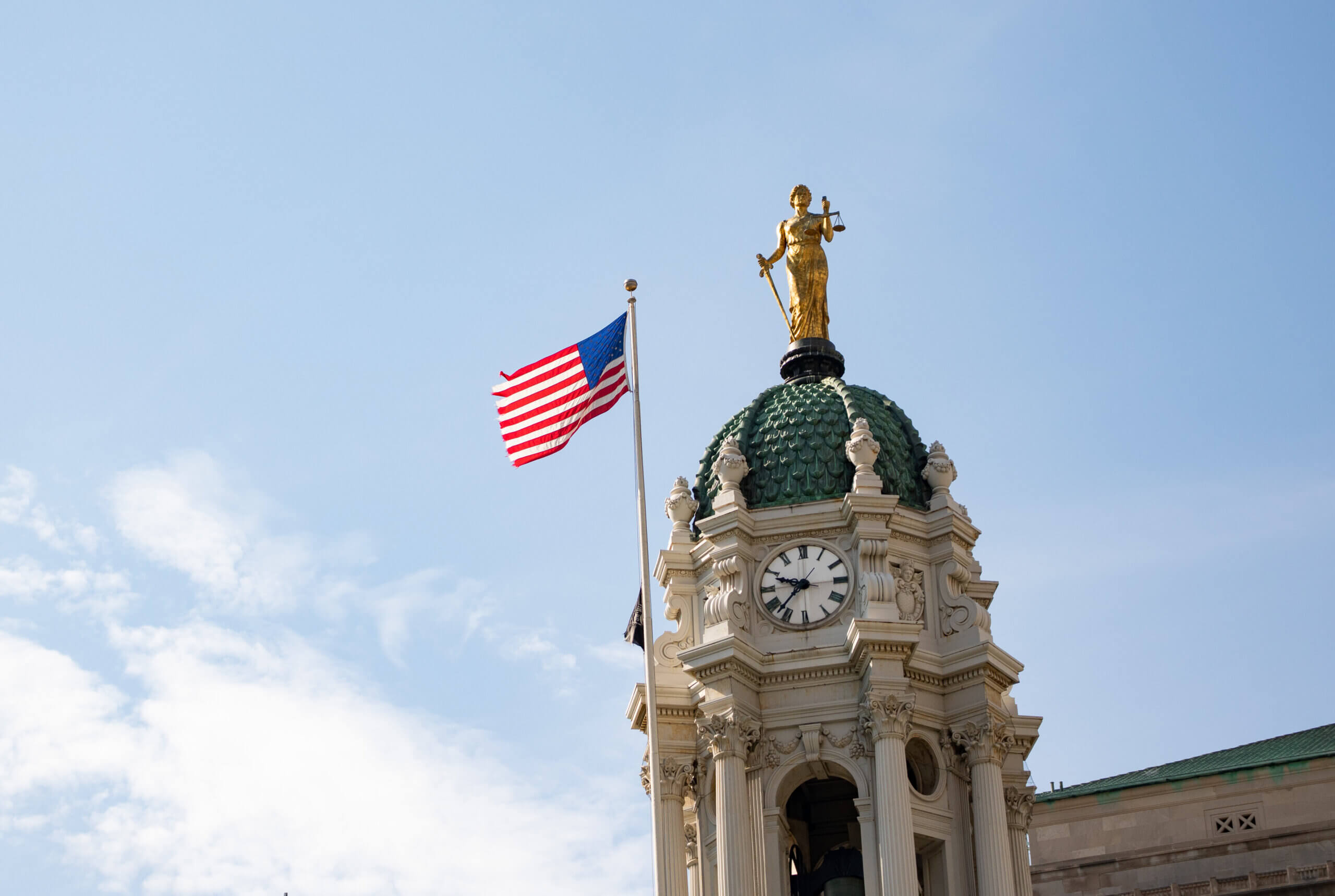 memorial day - a flag above borough hall in brooklyn