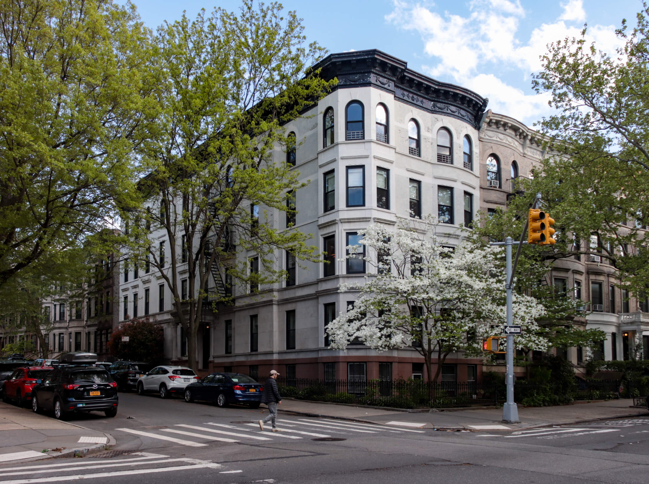 spring tree and buildings on 8th avenue