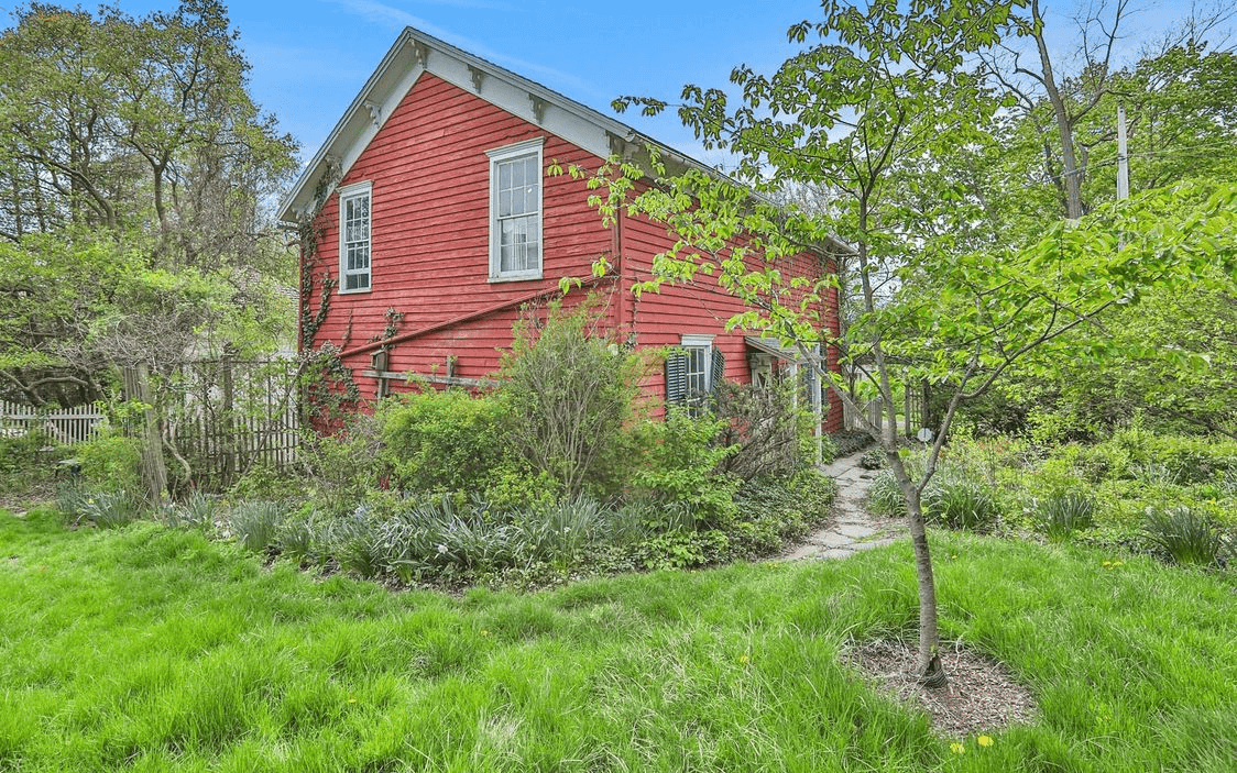 garage with bracketed roofline