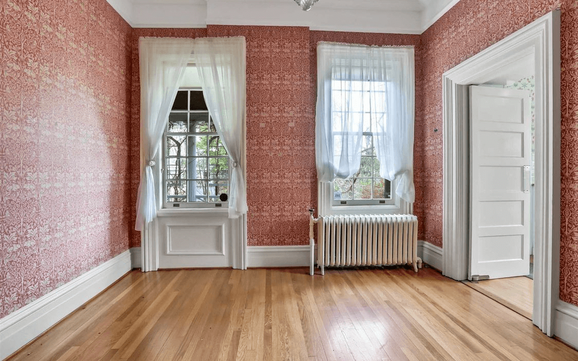 parlor with red wallpaper