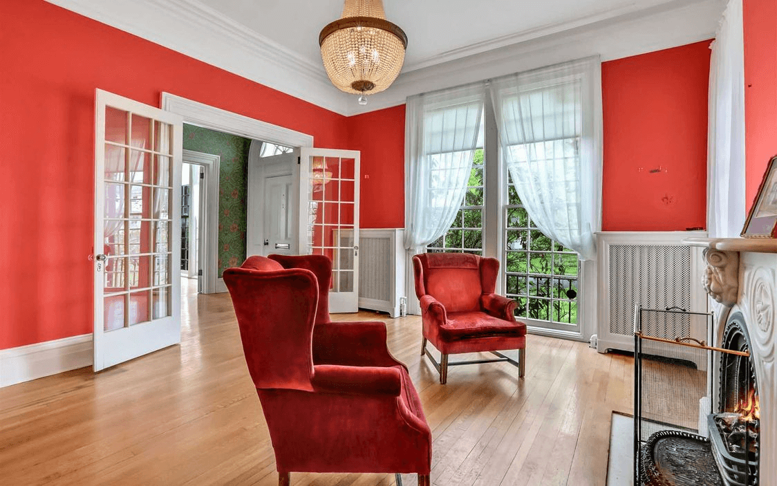 parlor with french doors to hallway