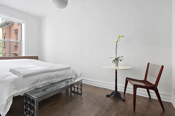 bedroom with dark floor