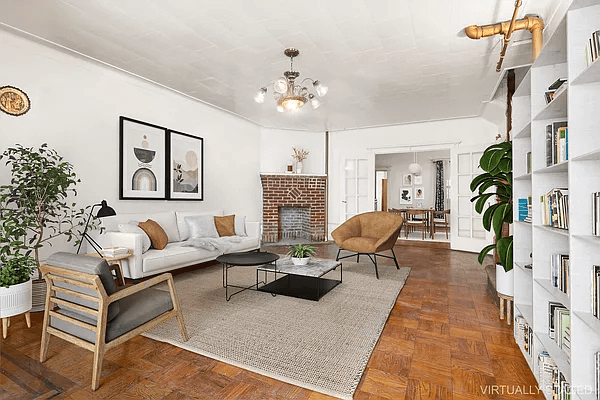 living room with corner mantel