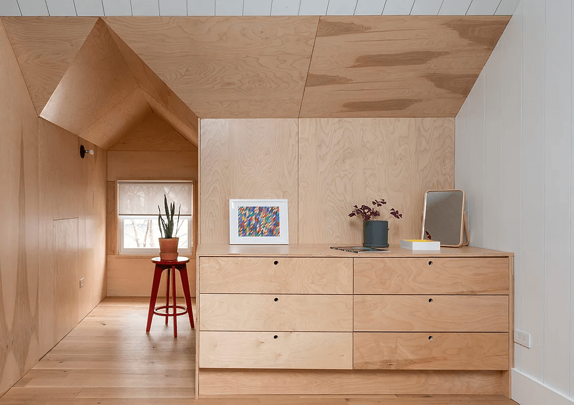 wood covered walls in the attic bedroom