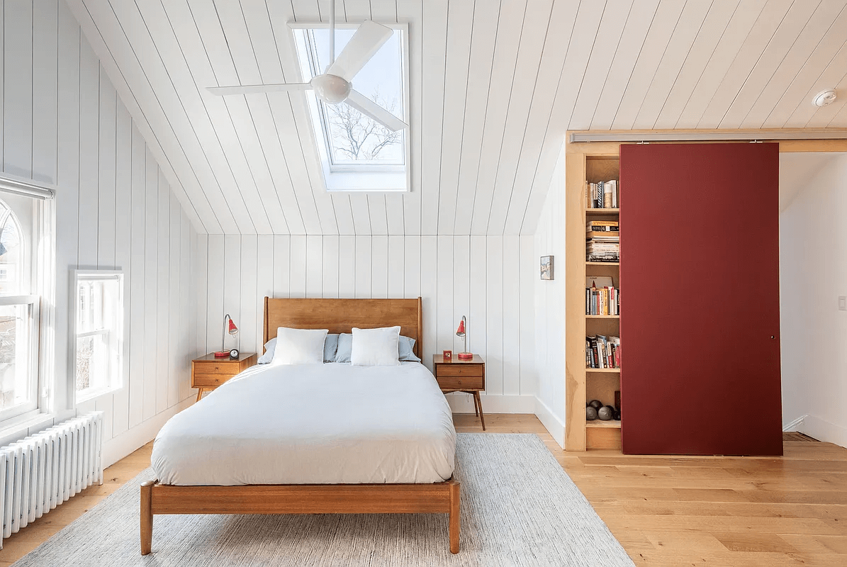 bedroom with red barn door