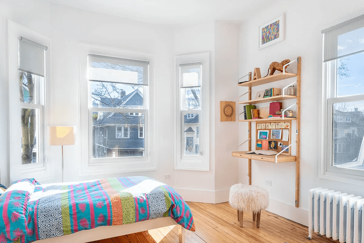 bedroom with four windows