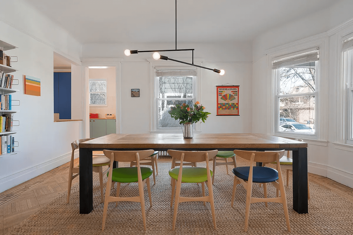 dining room with multiple windows