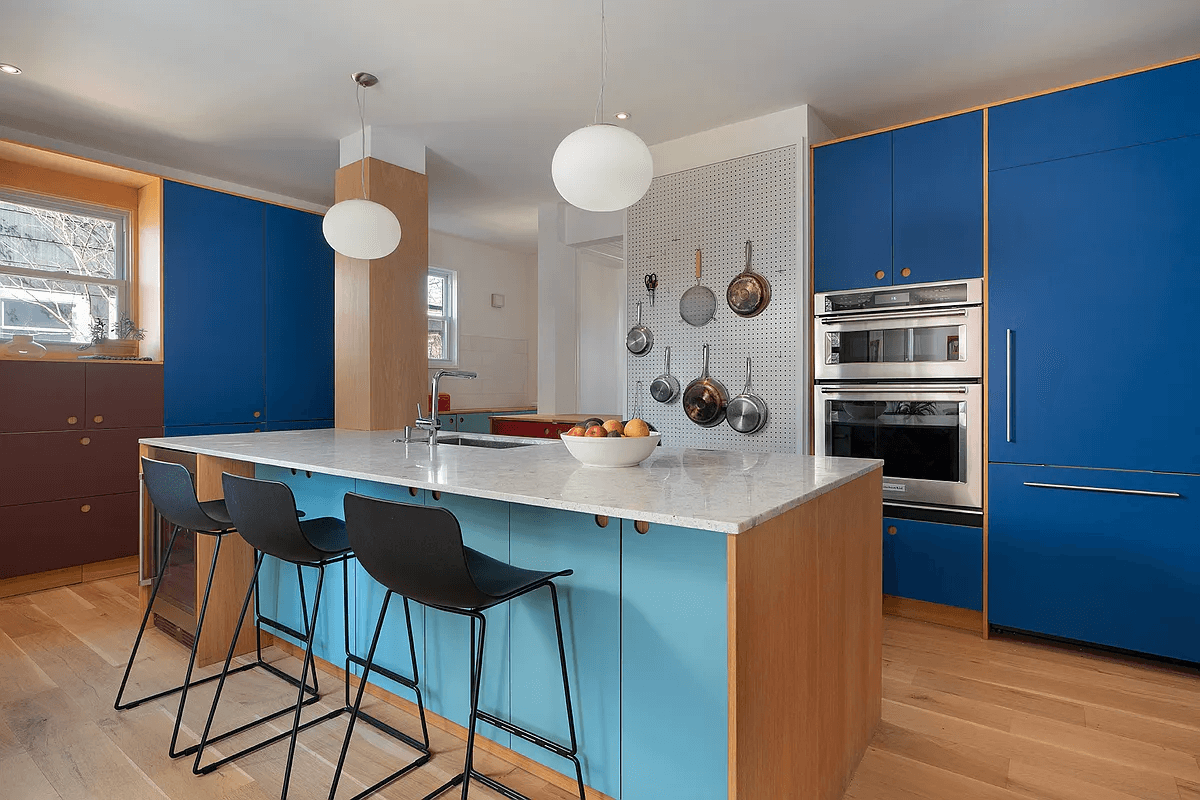 ditmas park house for sale kitchen with an island and a wall of pegboard