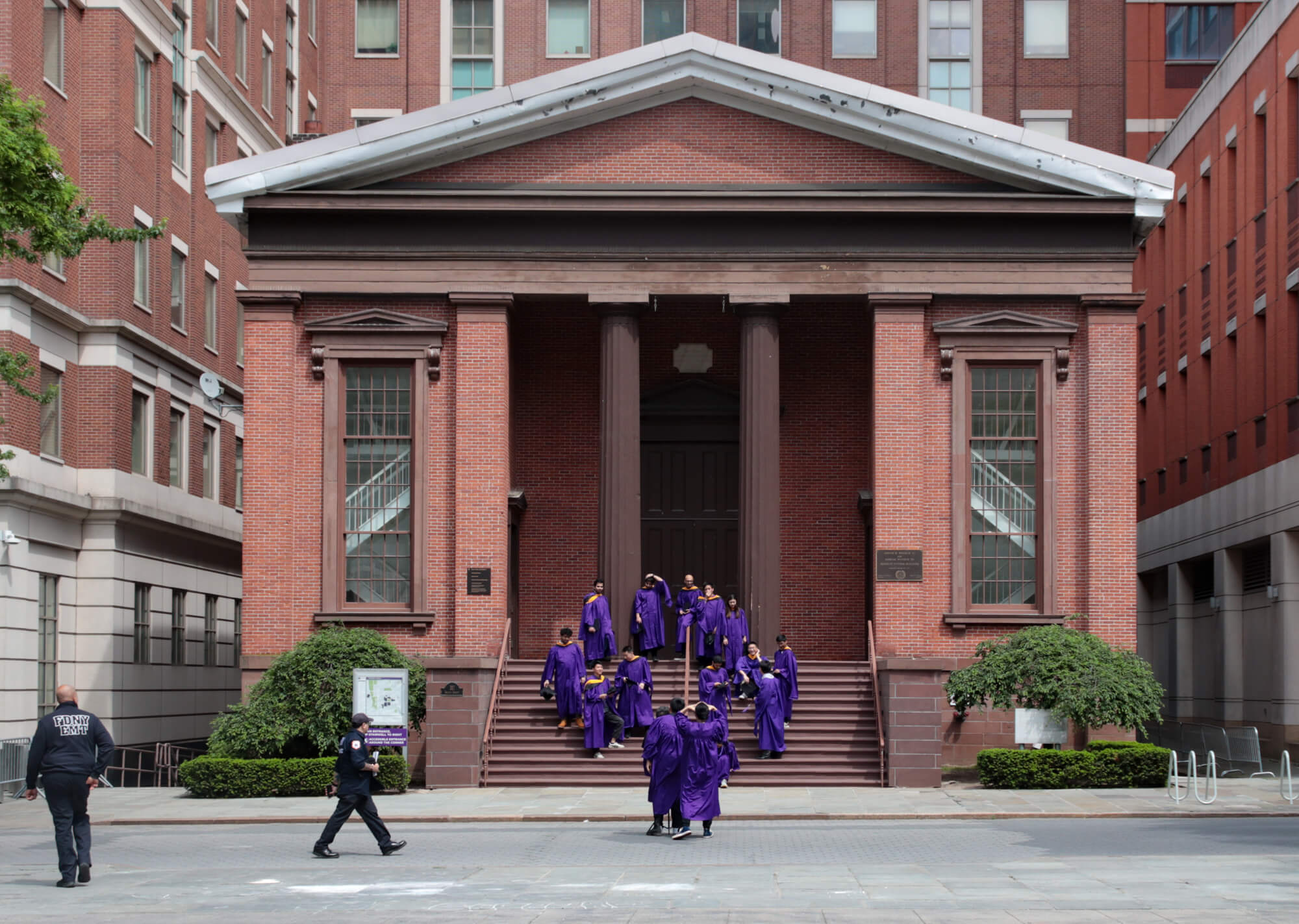 brooklyn news graduates in caps and gowns in downtown brooklyn