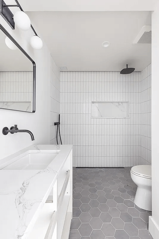 bathroom with white wall tile