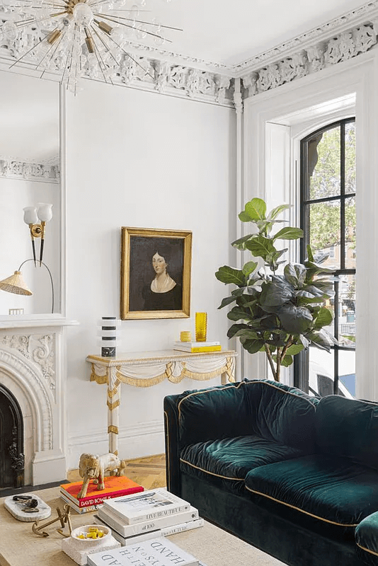 parlor with mantel and plasterwork