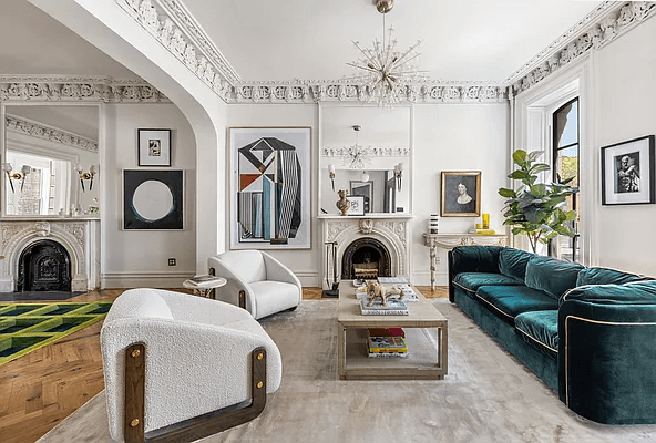 parlor with mantel and plasterwork