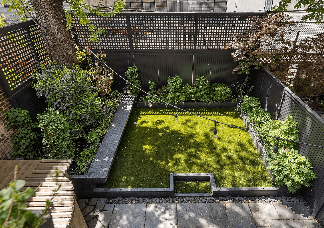 rear yard with planting beds