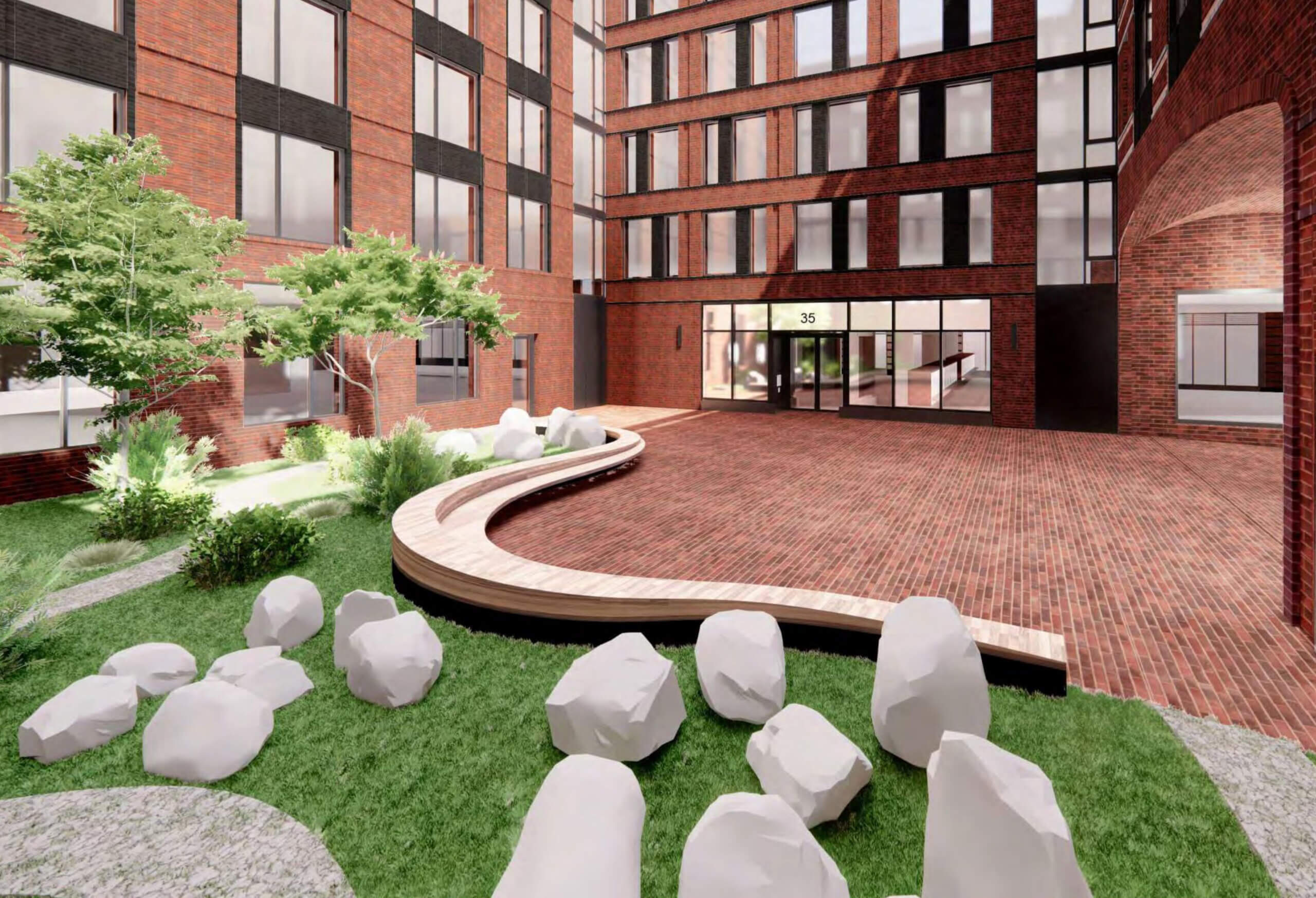 courtyard with brick pavers and landscaping