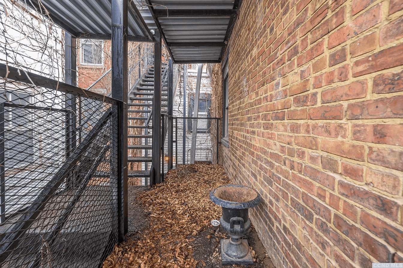 brick wall at rear of the property