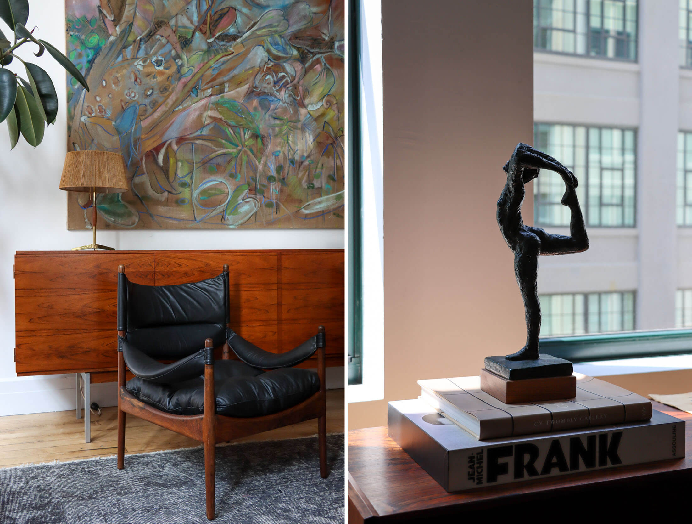 a chair in front of a sideboard and a sculpture on a table