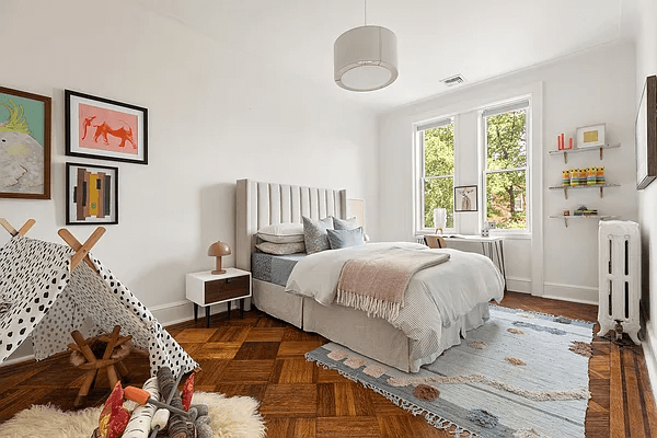 bedroom with wood floors