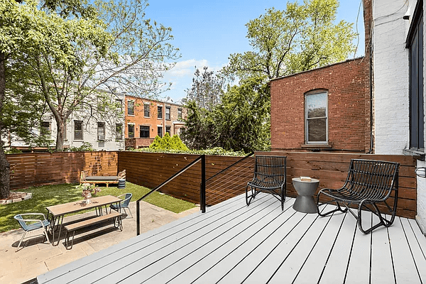 rear deck with steps down to yard