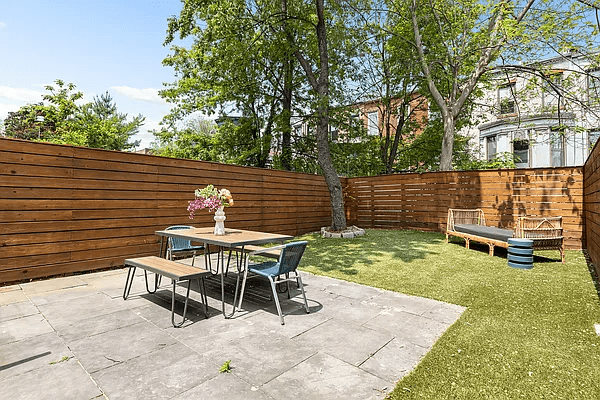 rear yard with patio and a horizontal fence