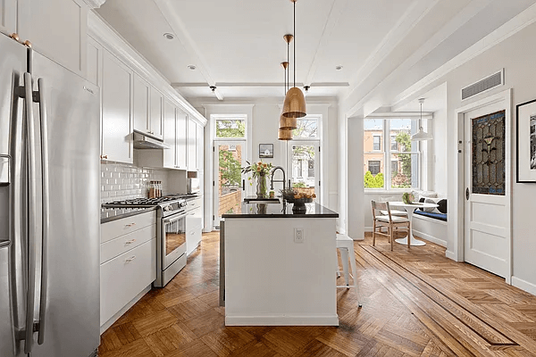 kitchen with wood floor and large island