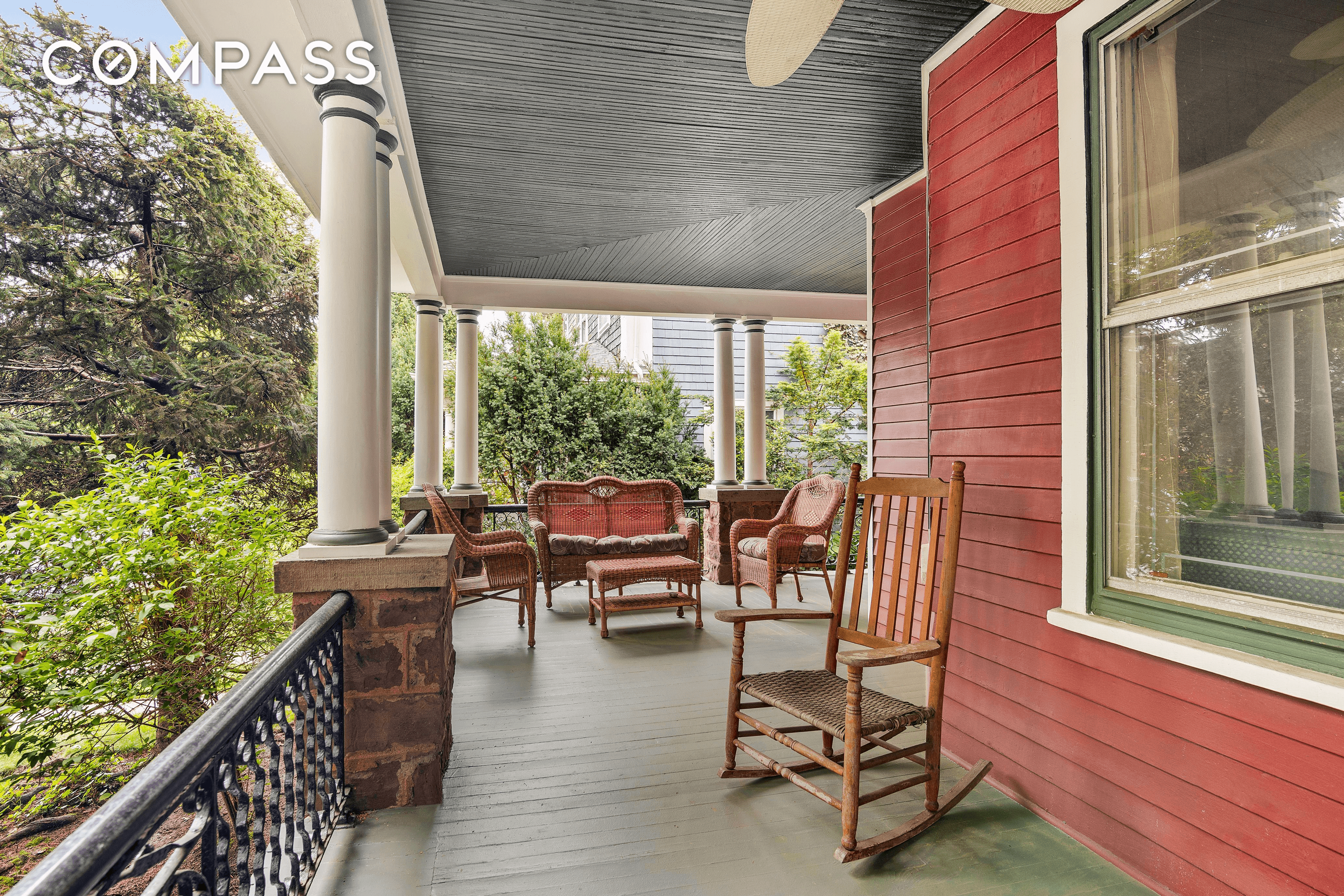 front porch with wood slat ceiling