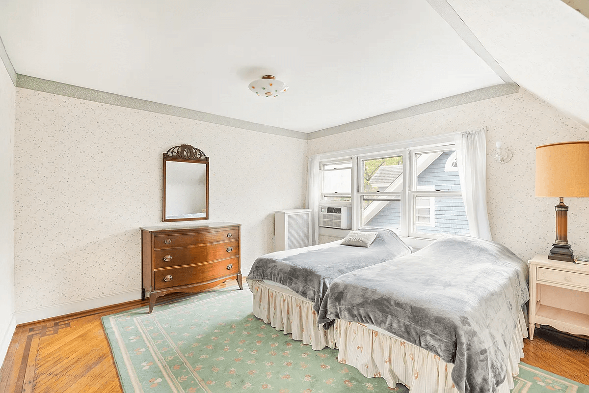 bedroom with wallpaper