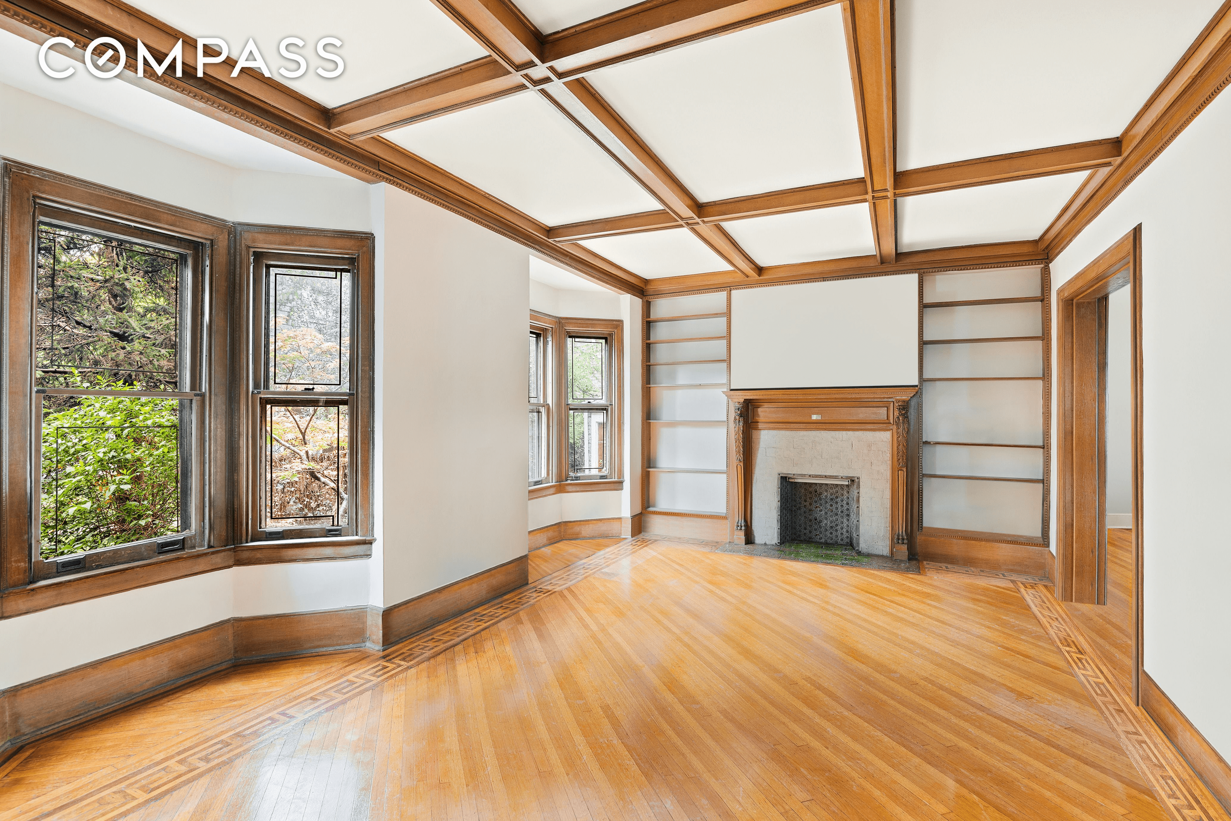 library with wood mantel