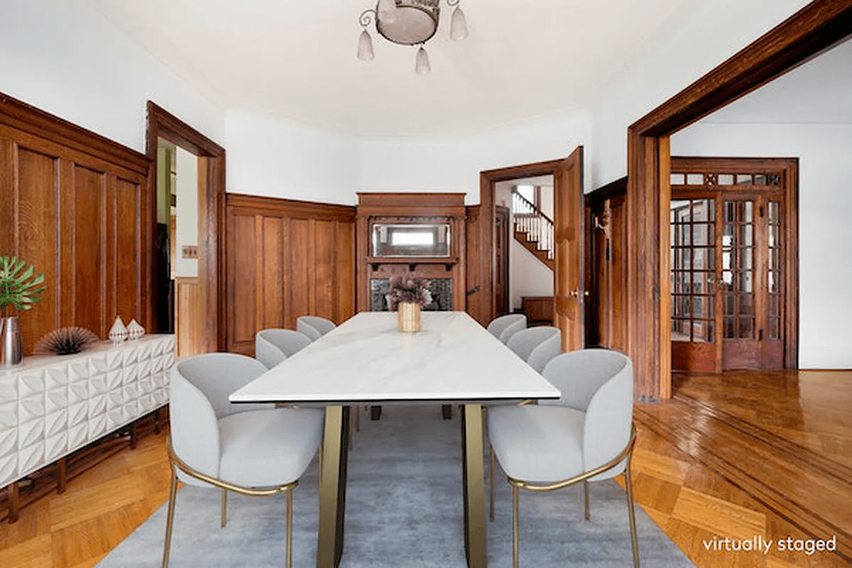 virtually staged dining room with wainscoting