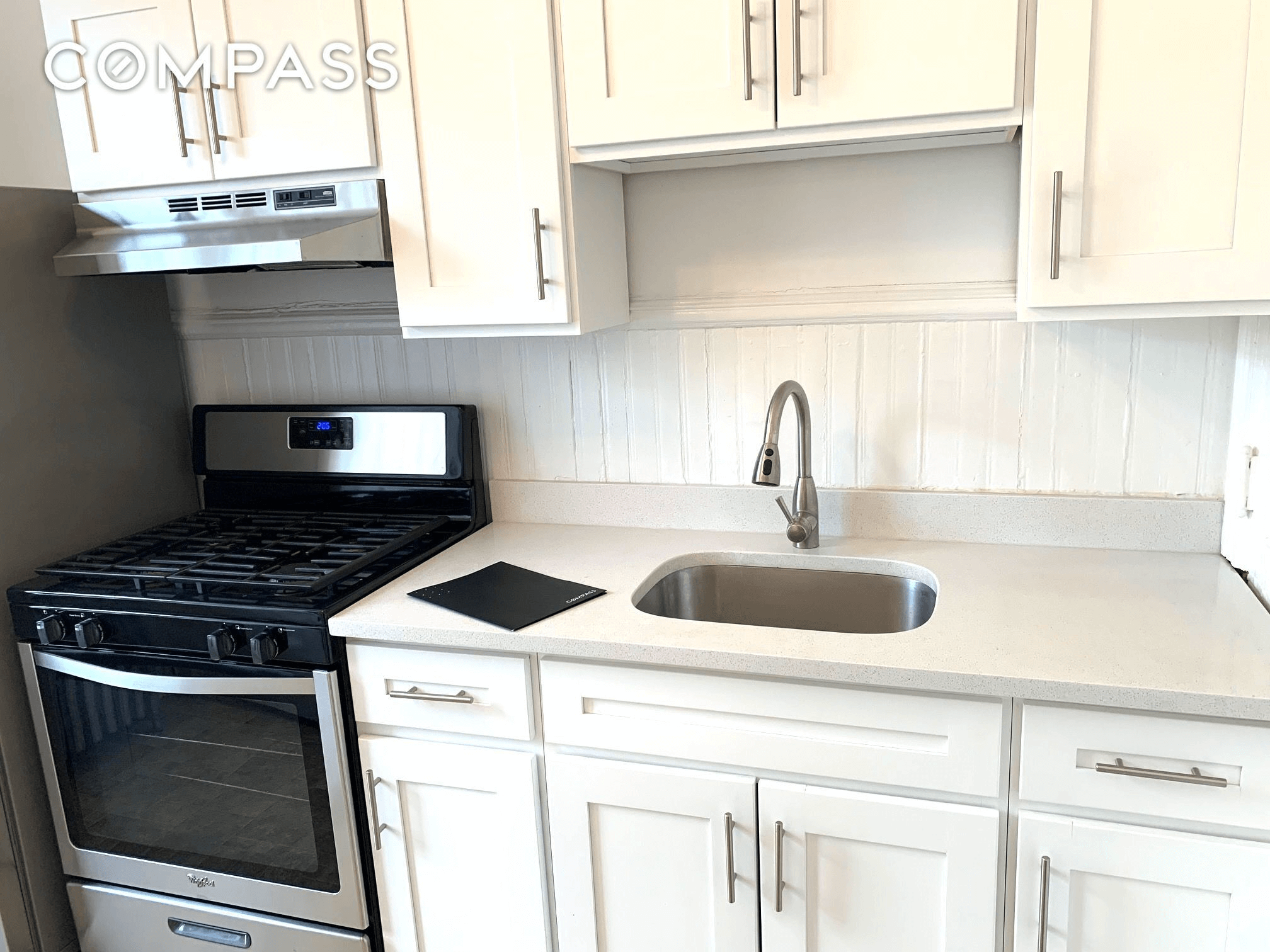 kitchen with white cabinets