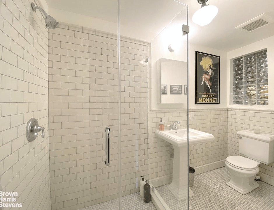 bathroom with shower with glass doors