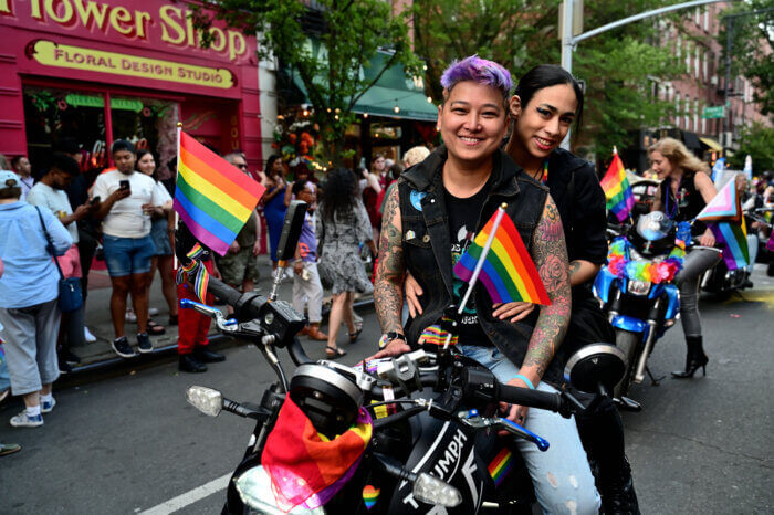brooklyn pride - parade goers on a motorcycle