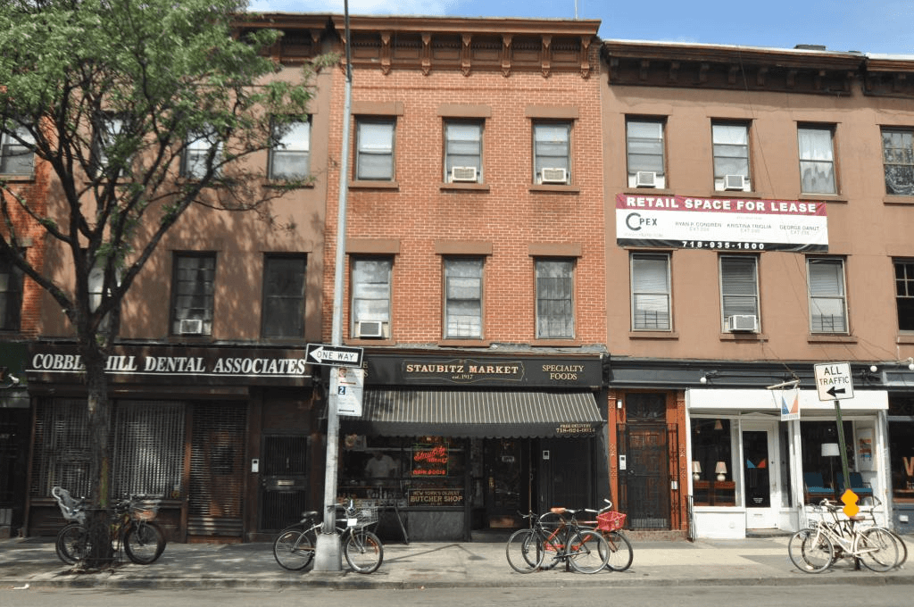 brick exterior of the building before scaffolding