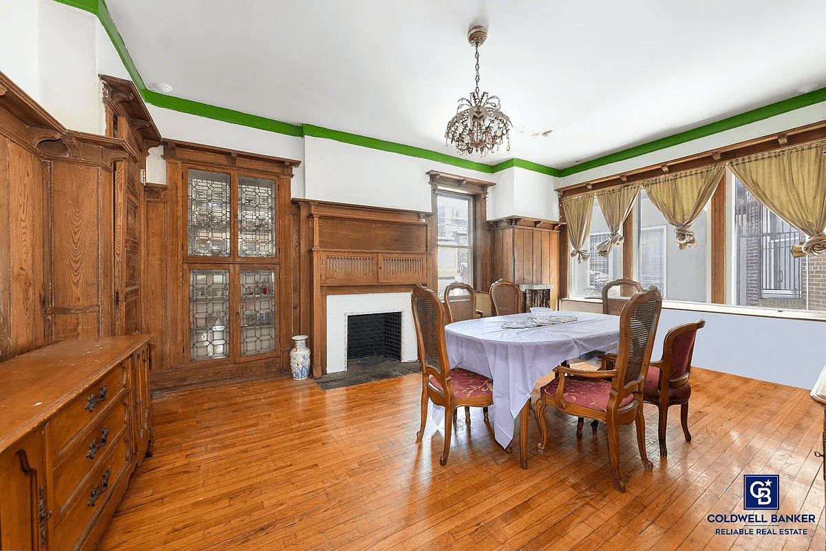 dining room with built-ins and mantels