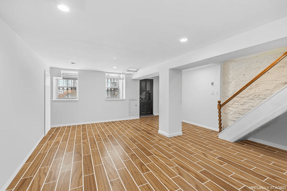 virtually staged basement with tile floor