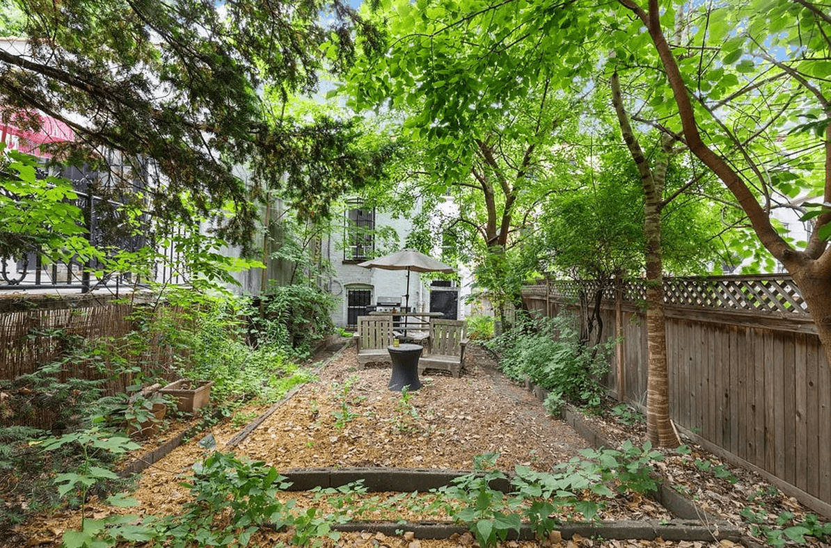 rear yard showing some edged planting beds