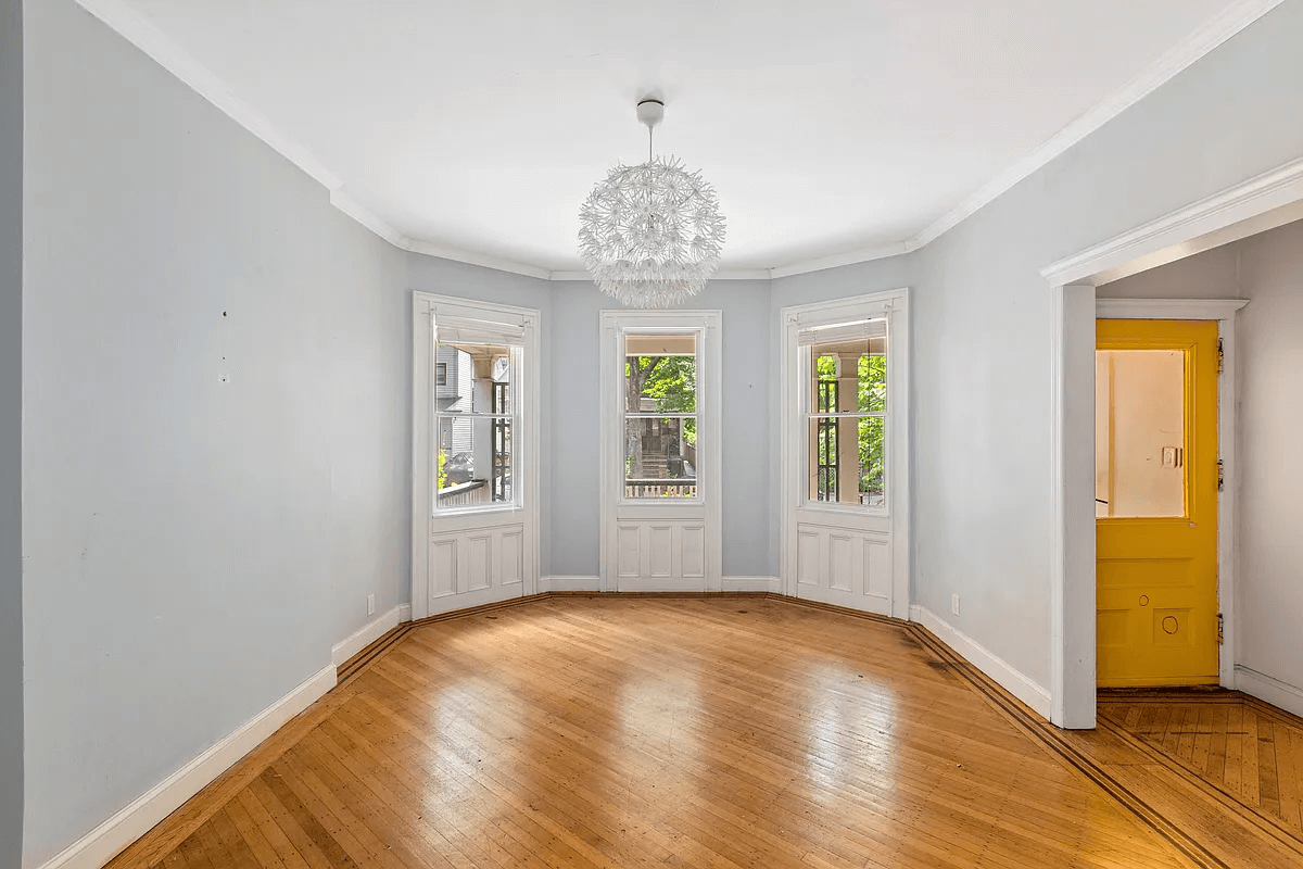 flatbush rental - view of the bay window and wood floors in the living room