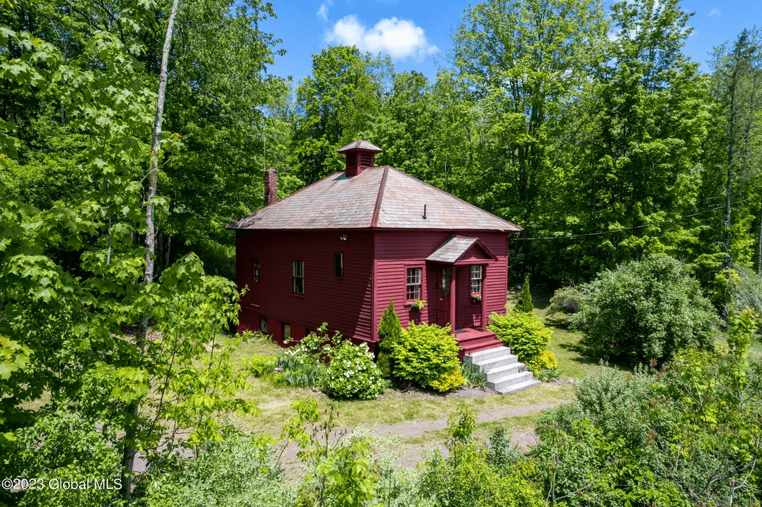 red schoolhouse turned dwelling