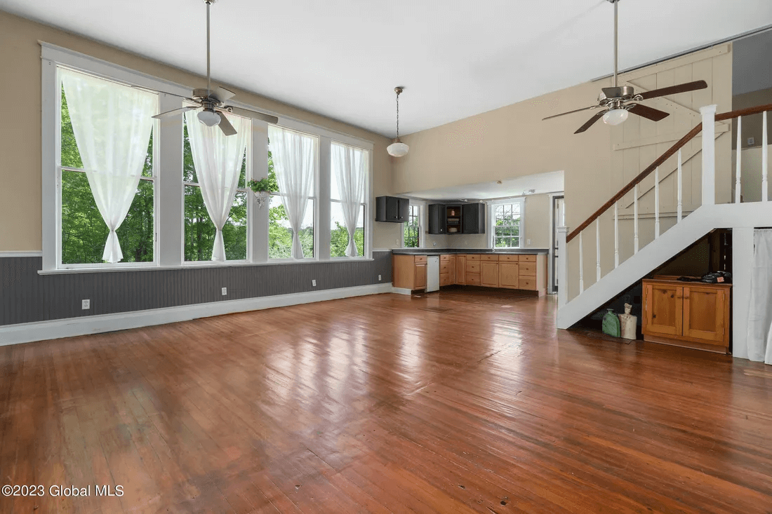 interior showing wall of windows in studio space