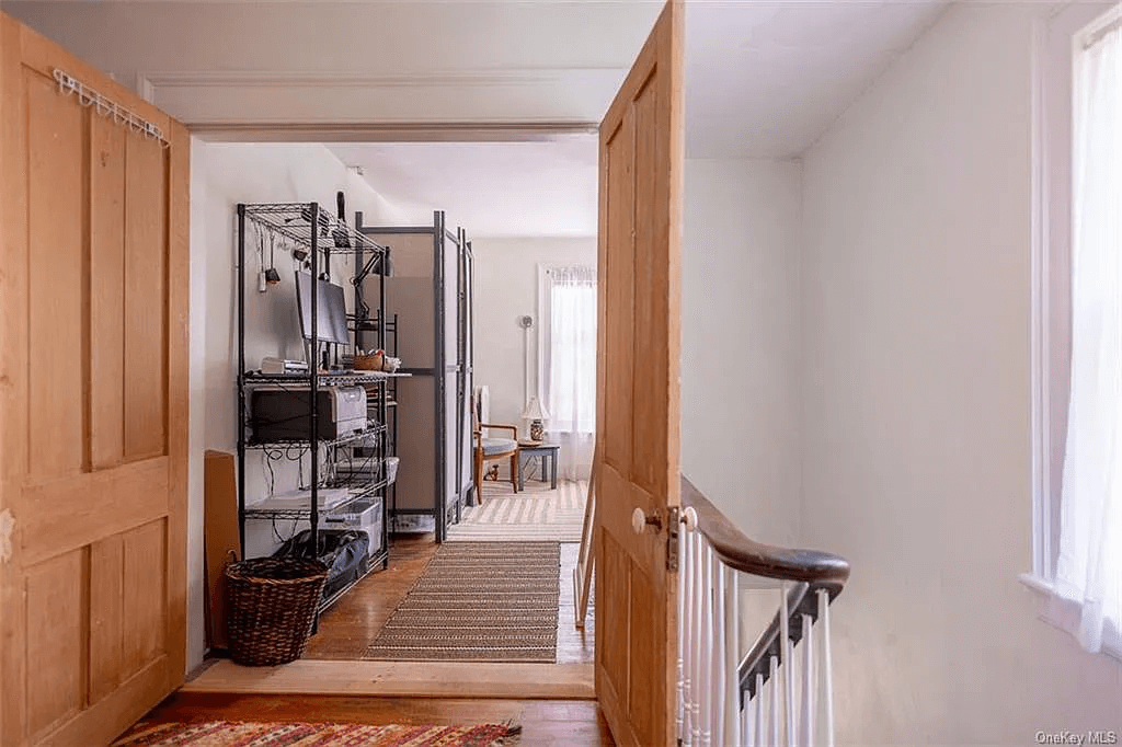 hall with view into bedroom