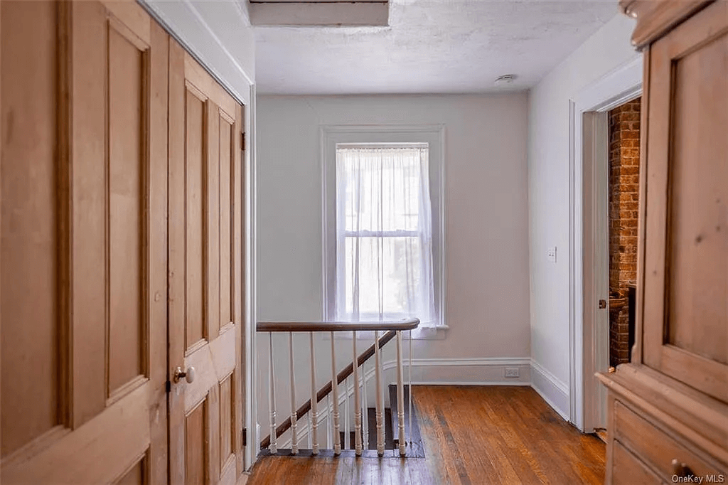 upstairs hallway with original stair