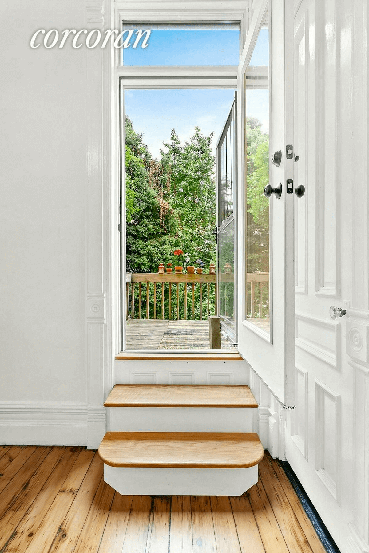 view of glass door out to deck