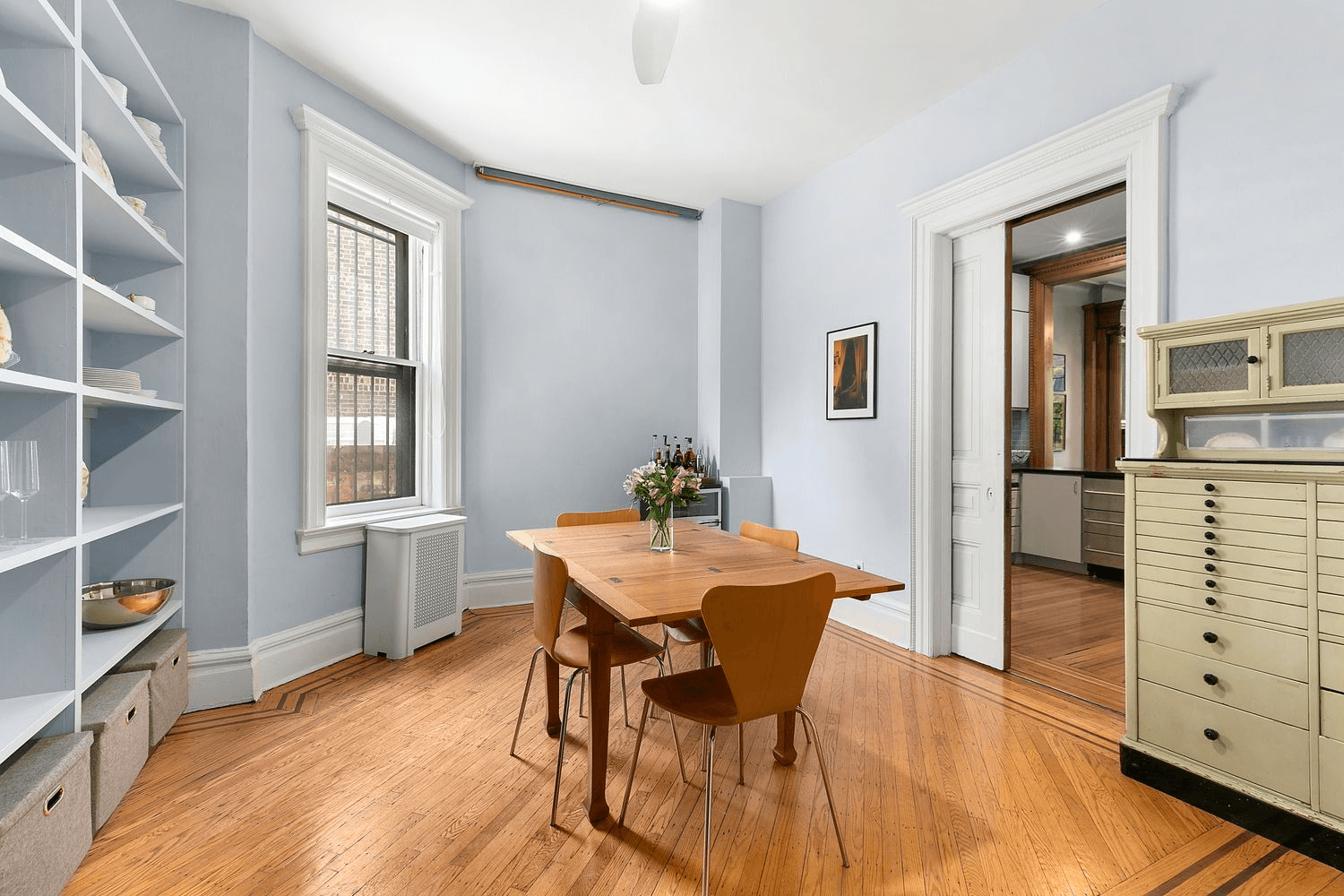 dining room with white painted pocket door