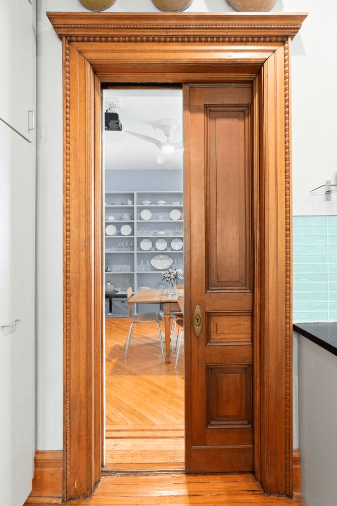 pocket door between kitchen and dining room