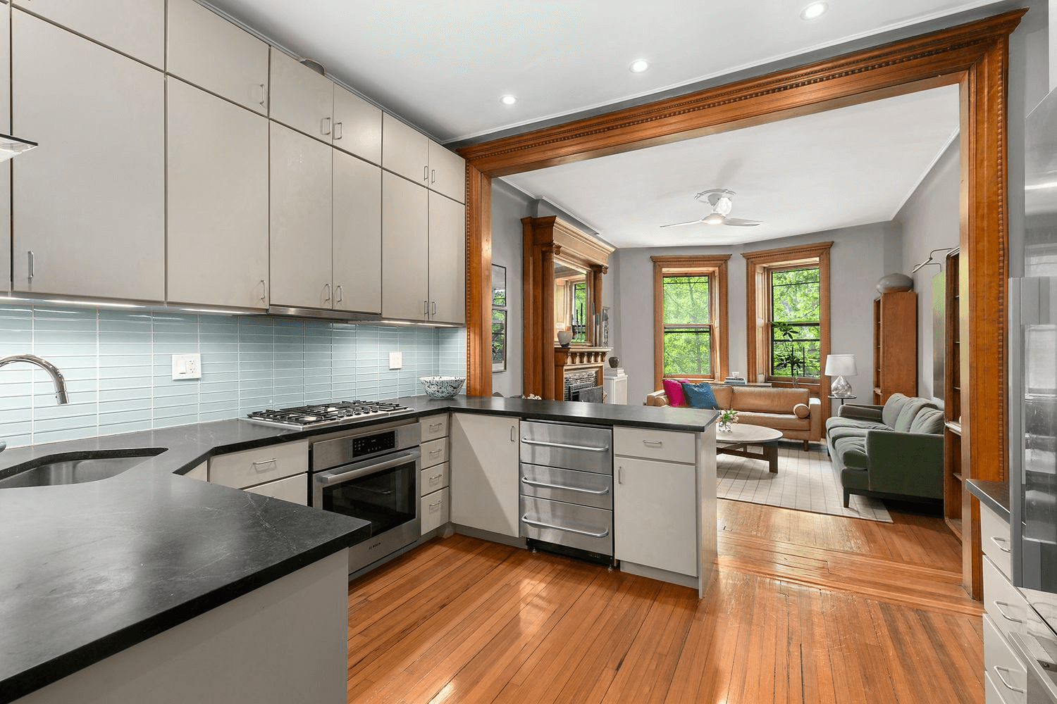 kitchen with a counter separating it from the living room