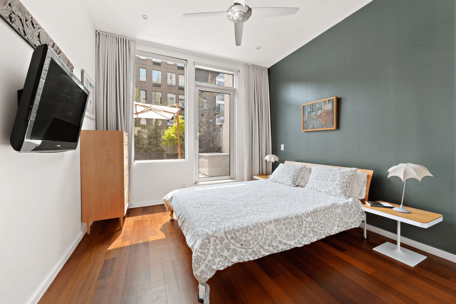 bedroom with glass door out to terrace